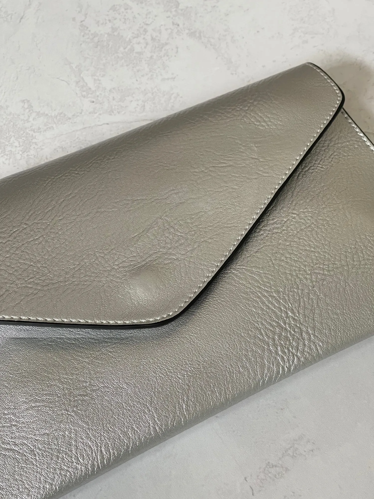 METALLIC SILVER OVER-SIZED ENVELOPE CLUTCH BAG WITH LONG CROSS BODY AND WRISTLET STRAP