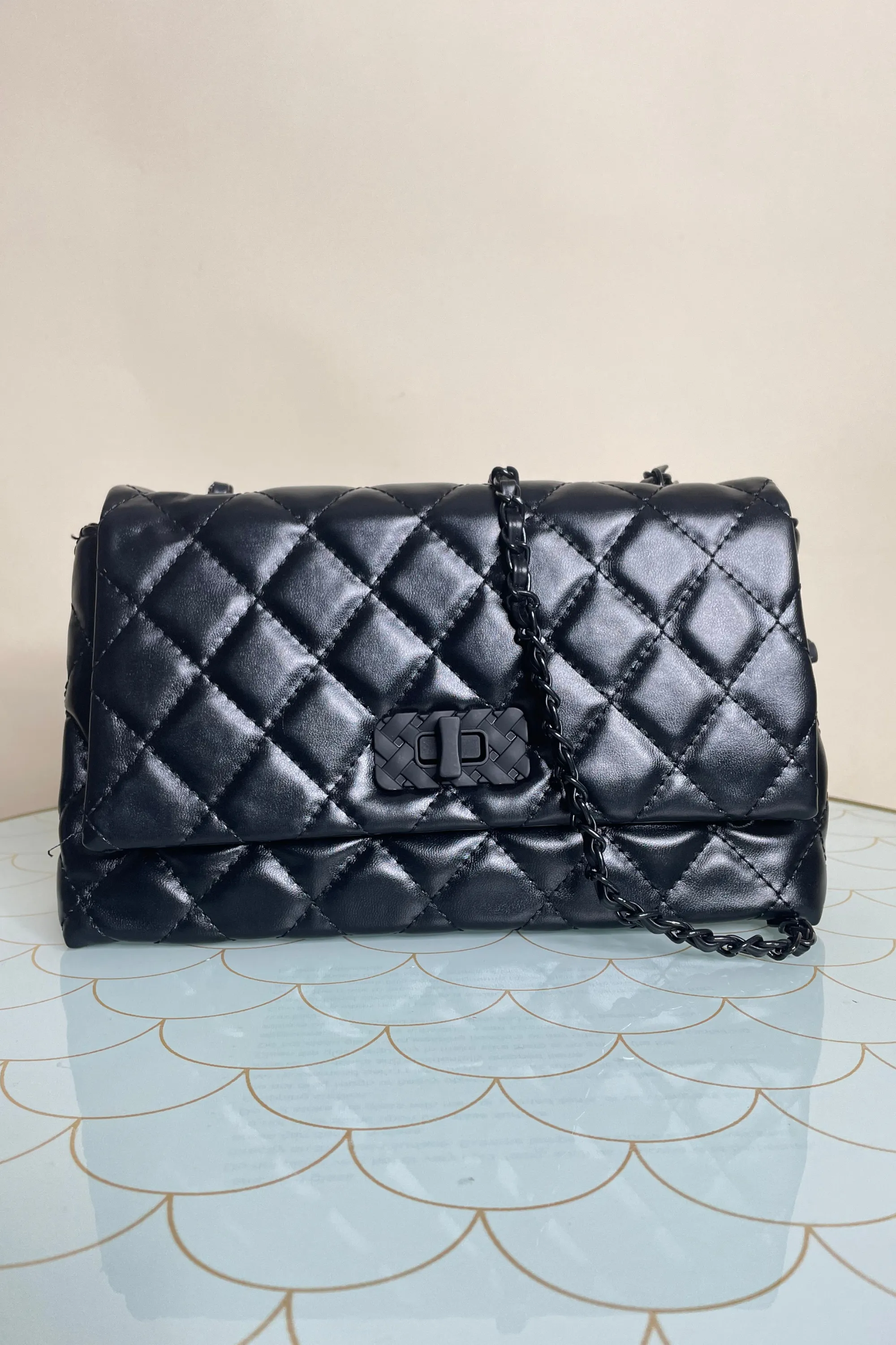 Quilted padded black across body bag