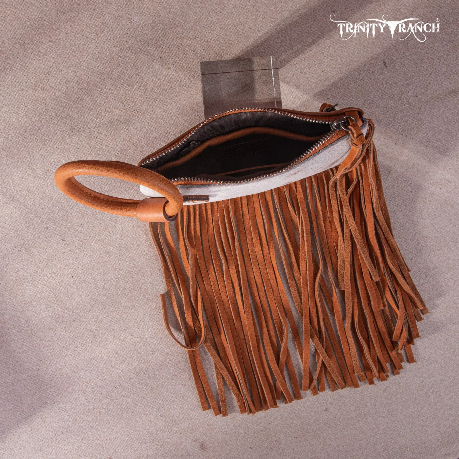 TR167-A181 Trinity Ranch Genuine Hair-On Cowhide Ring Handle Wristlet Clutch Bag - Light Brown