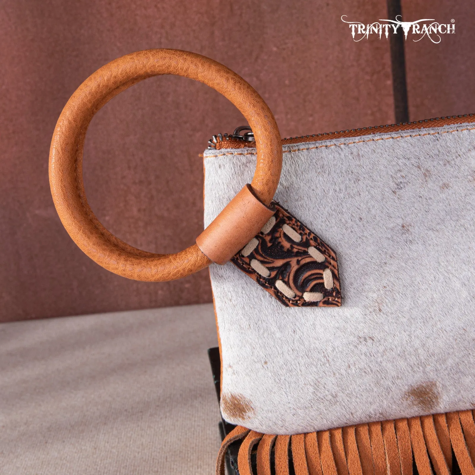 TR167-A181 Trinity Ranch Genuine Hair-On Cowhide Ring Handle Wristlet Clutch Bag - Light Brown